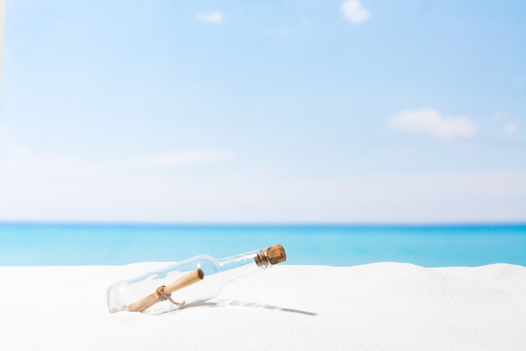 A message in a bottle at sea